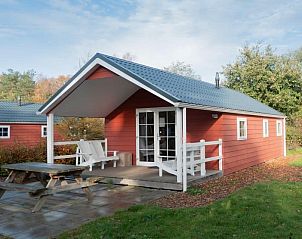 Boslodge 6 in Otterlo, Veluwe, Gelderland, Ferienhaus mit Veranda und grner Umgebung.