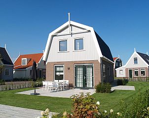 Vakantiehuis Speeltoren 8 in Uitdam, Amsterdam eo, Noord-Holland met zonnig terras en groene omgeving.