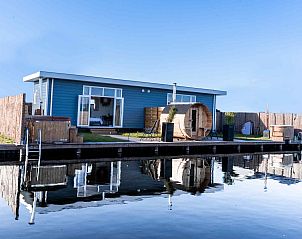 Verblijf 560459 • Vakantiewoning Utrecht noord • Luxe 2 persoons Tiny House met Hottub en Sauna aan de 